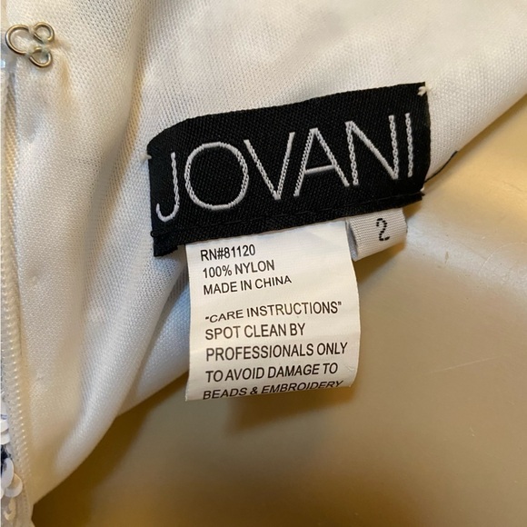 Wedding gown, prom or evening gown by Jovani. Never worn. Classy train. - Picture 8 of 10